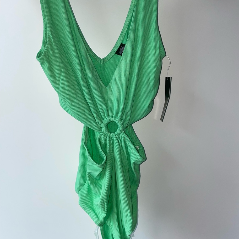 Wild fable green bodysuit -never worn (size medium)